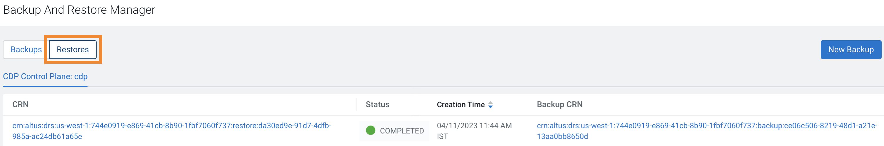 The sample image shows the Restores tab on the Backup and Restore Manager. It shows the restore backup entity name, list of all restores, the current status of the restore event, the timestamp when the restore event started, and the backup CRN of the backup event.